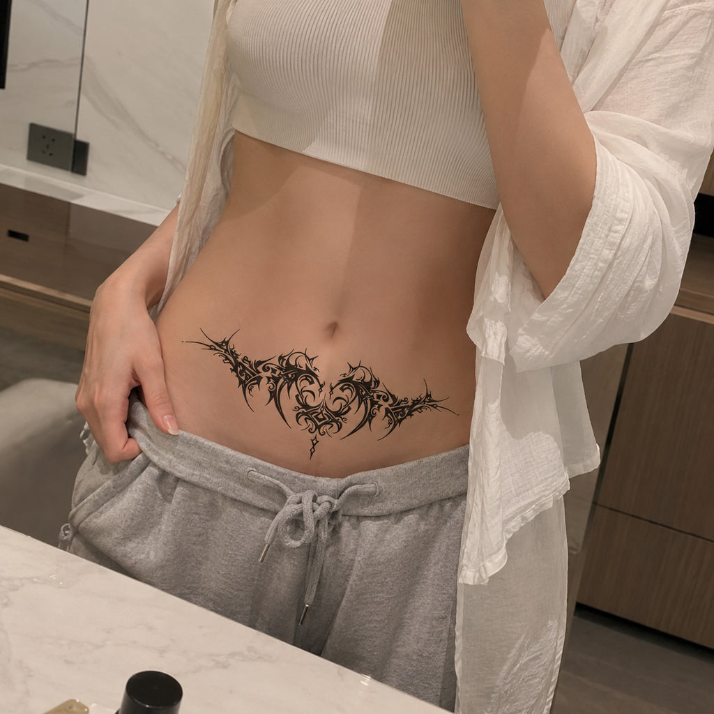 Thorn Oath gothic tribal heart temporary tattoo worn on the lower stomach