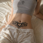Woman wearing the Victorian Heart baroque heart temporary tattoo on the lower stomach