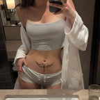 Phantom Bloom abstract butterfly temporary tattoo applied across the lower abdomen