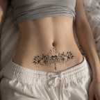 Woman wearing the Sacred Bloom ornamental floral temporary tattoo on the lower abdomen