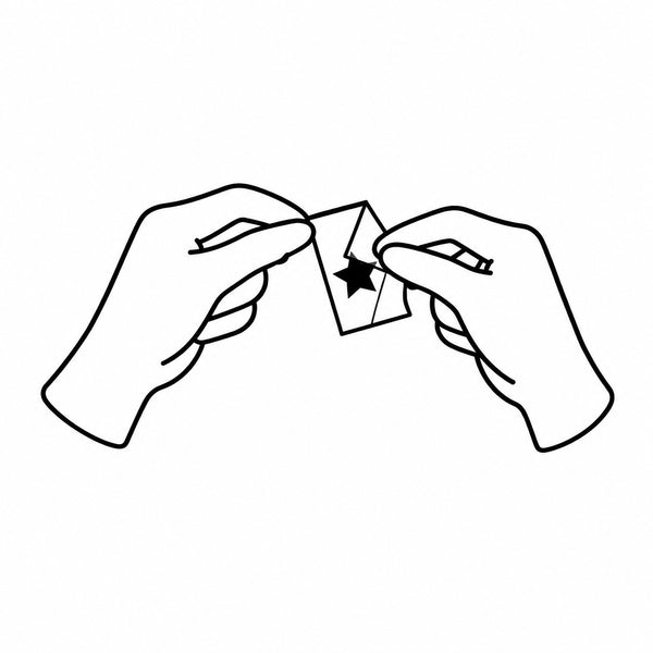 Peeling off the protective film from a temporary tattoo